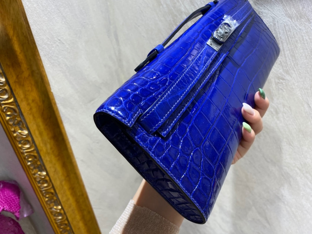 HERMES KELLY CUT 31 IN ADMIRAL BLUE SHINNY ALLIGATOR LEATHER WITH SILVER HARDWARE