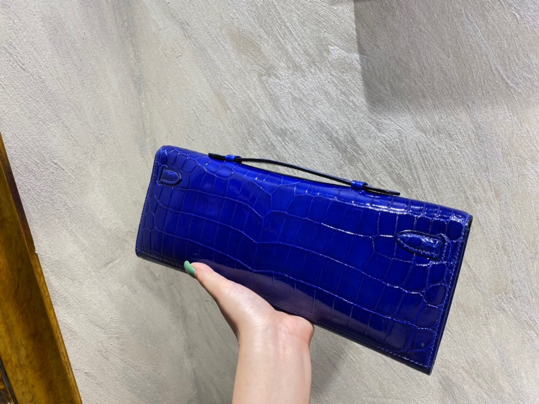 HERMES KELLY CUT 31 IN ADMIRAL BLUE SHINNY ALLIGATOR LEATHER WITH SILVER HARDWARE