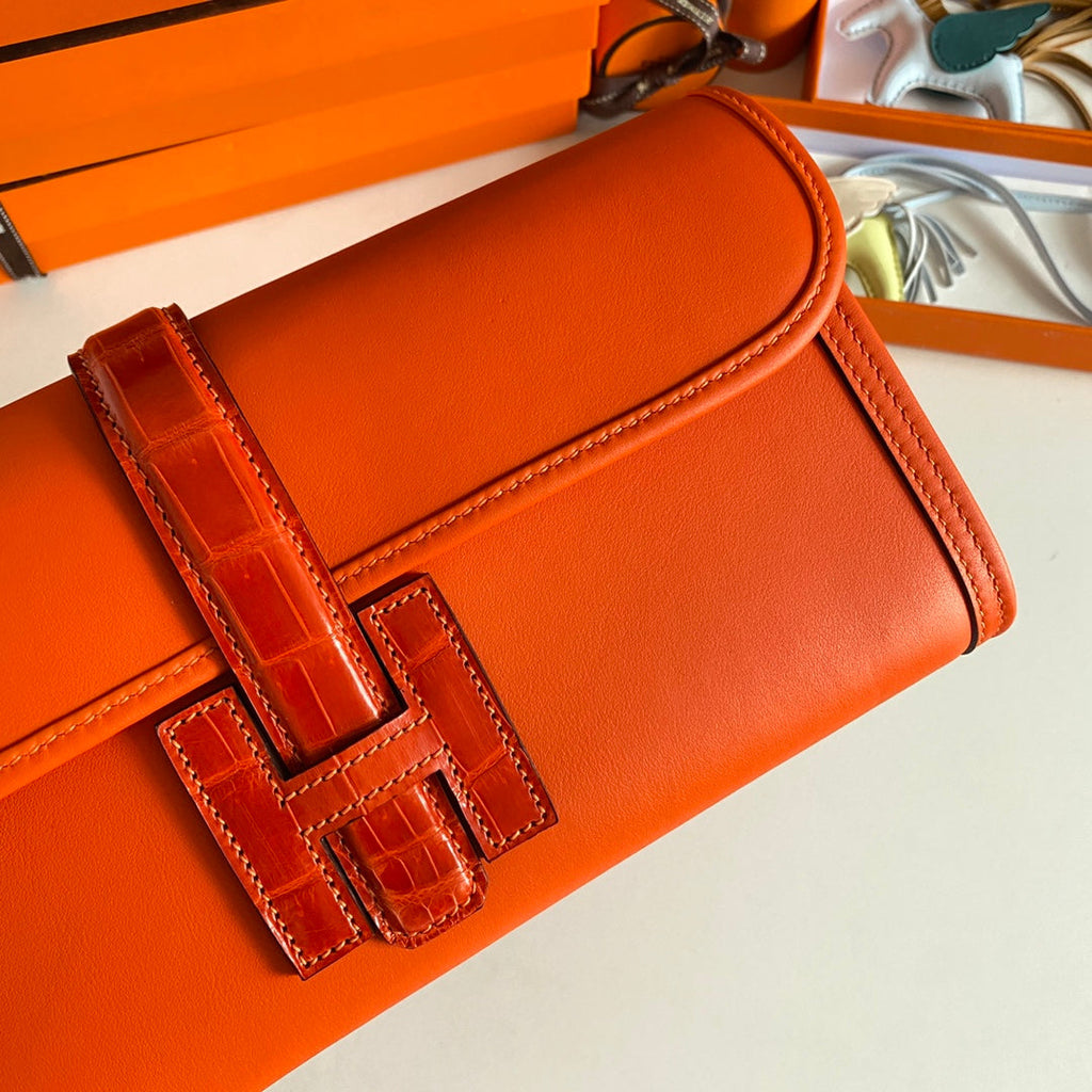 HERMES JIGE ELAN 29 CLUTCH IN BRIGHT ORANGE CALFSKIN WITH LIZARD SKIN