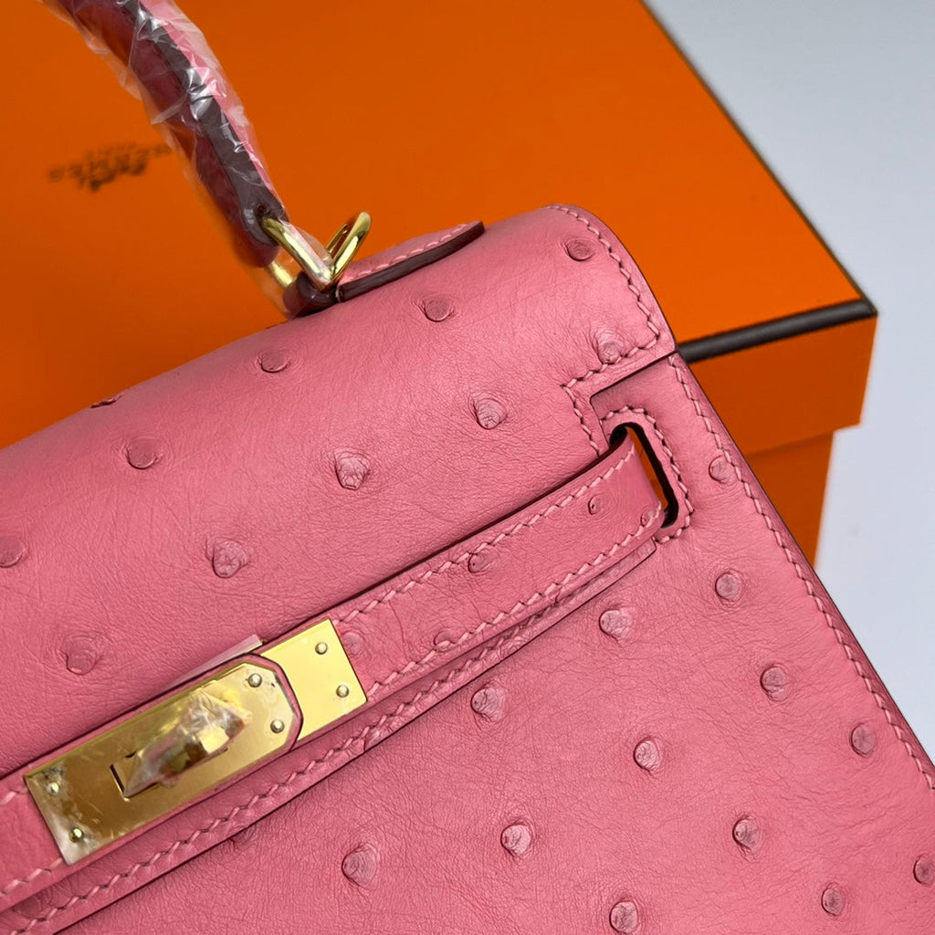 HERMES KELLY BAG 20 IN ROUGE PINK OSTRICH LEATHER WITH GOLD HARDWARE