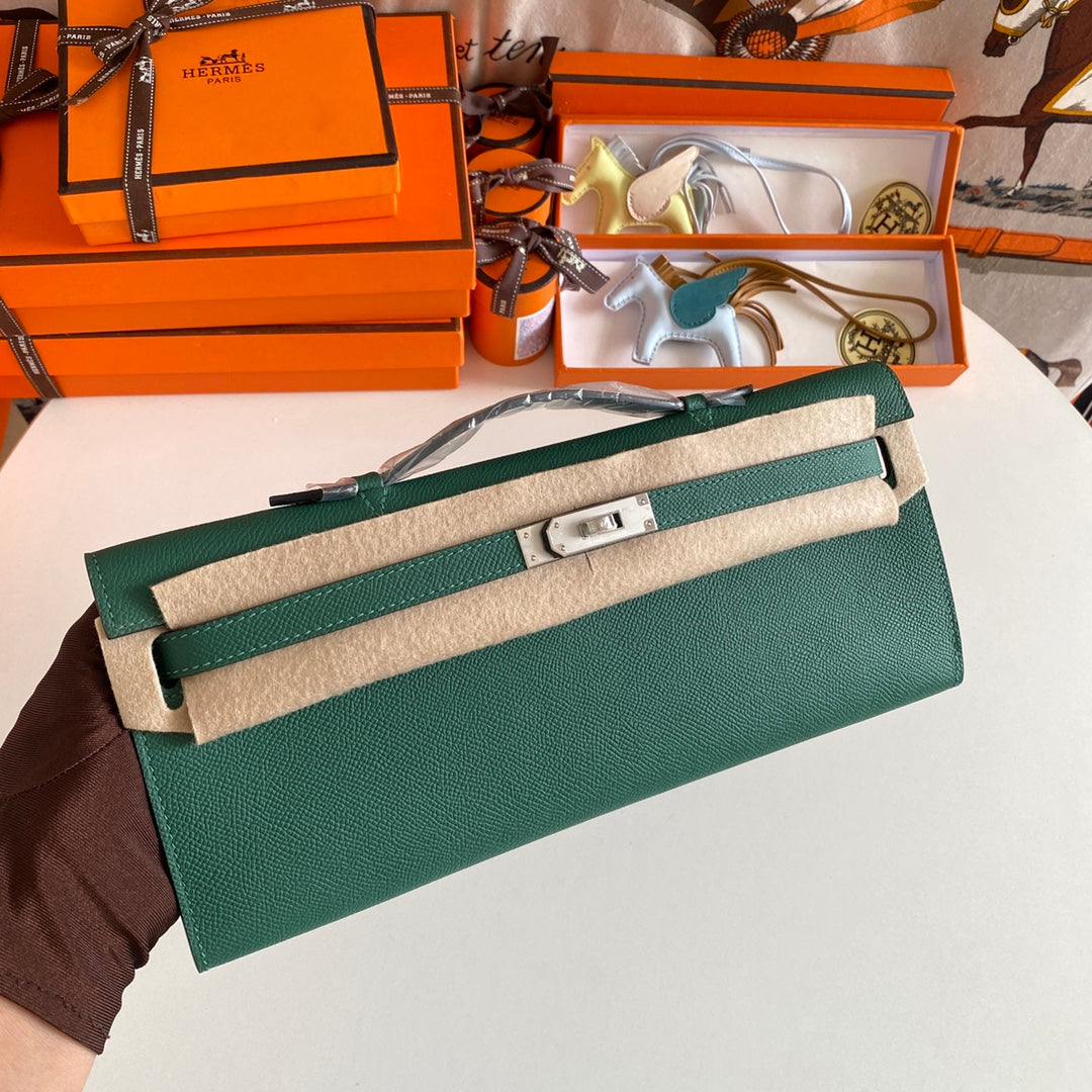 HERMES KELLY CUT 31 IN GREEN FOREST CALFSKIN WITH SILVER HARDWARE