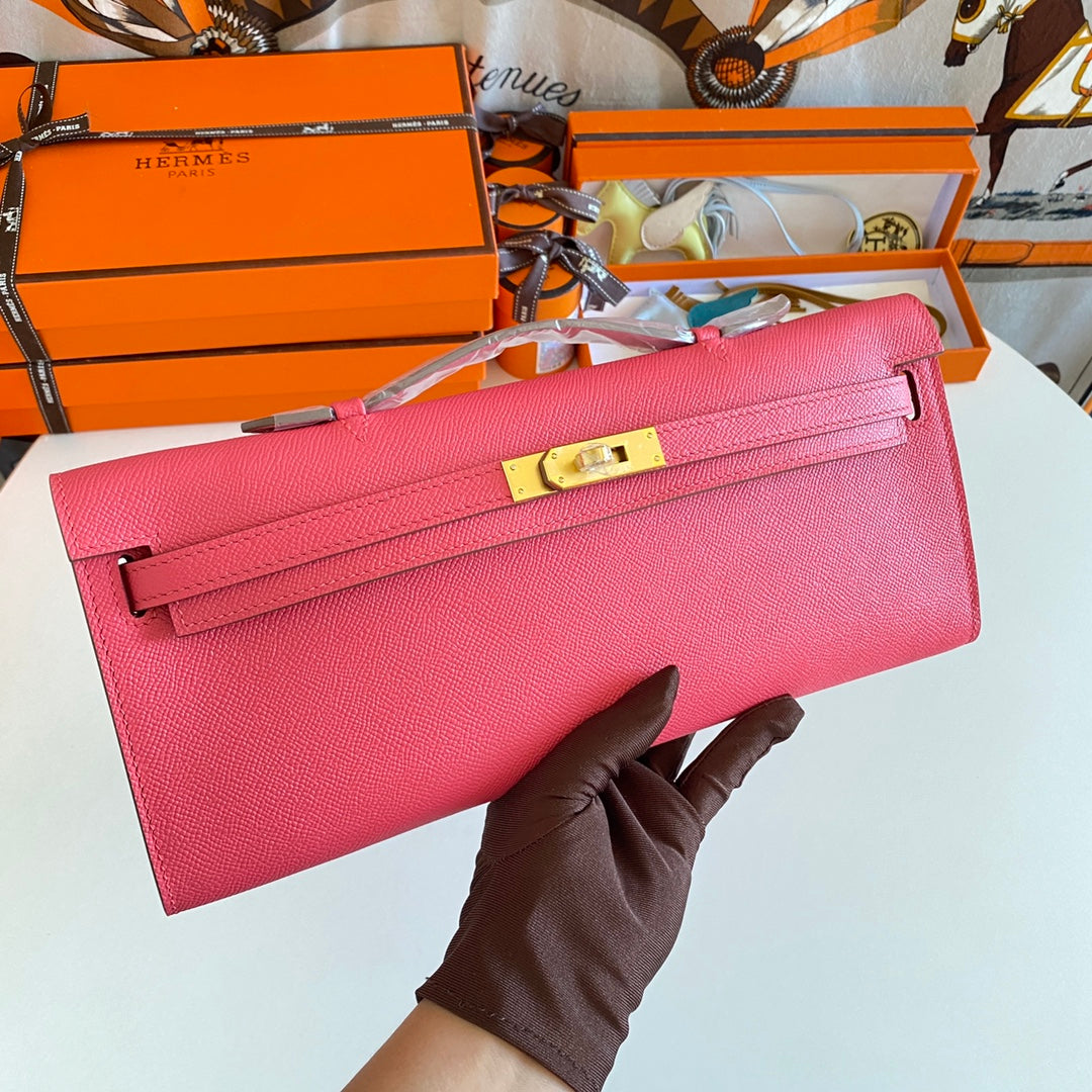 HERMES KELLY CUT 31 IN WATERMELON PINK CALFSKIN WITH GOLD HARDWARE
