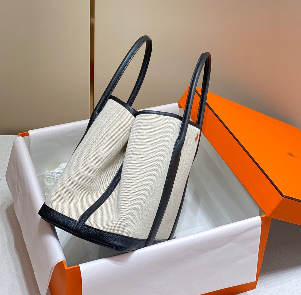 HERMES GARDEN PARTY 36CM IN WHITE TOILETS COTTON CANVAS AND BLACK CALFSKIN