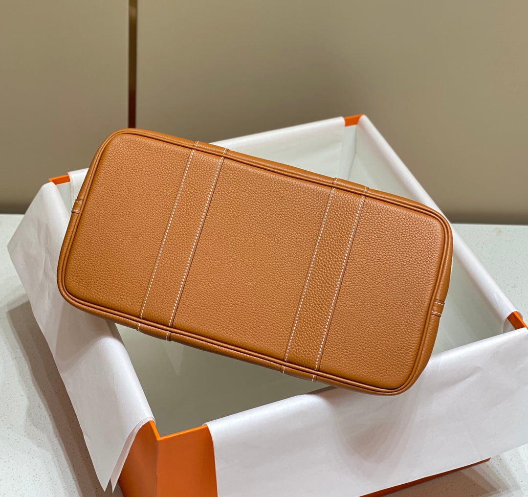 HERMES GARDEN PARTY 36CM IN WHITE TOILETS COTTON CANVAS AND BROWN CALFSKIN