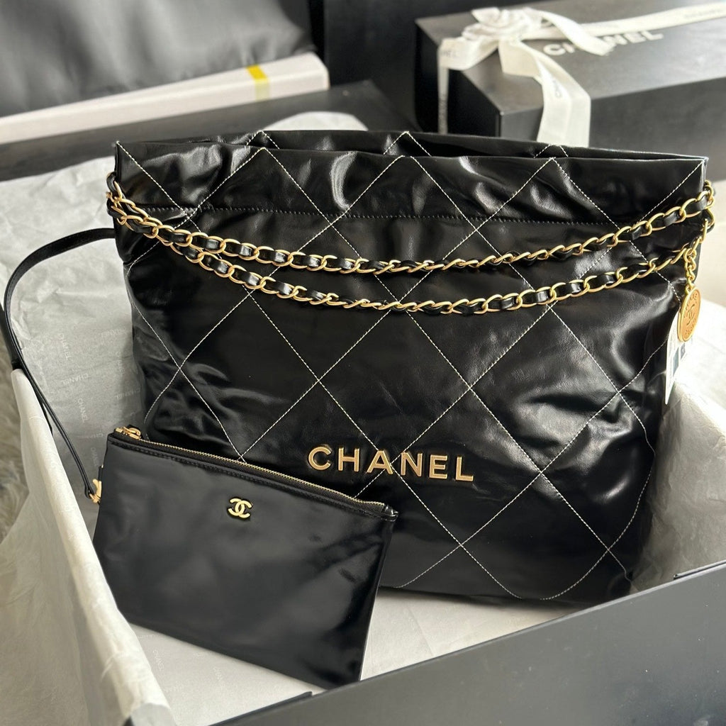 CHANEL LARGE 42 HANDBAG IN BLACK SHINY CALFSKIN GOLD HARDWARE