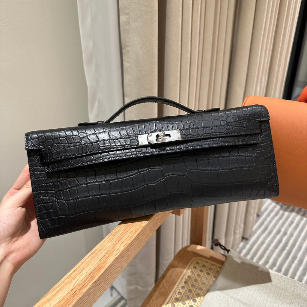HERMES KELLY CUT 31 IN BLACK SHINY ALLIGATOR LEATHER WITH SILVER HARDWARE