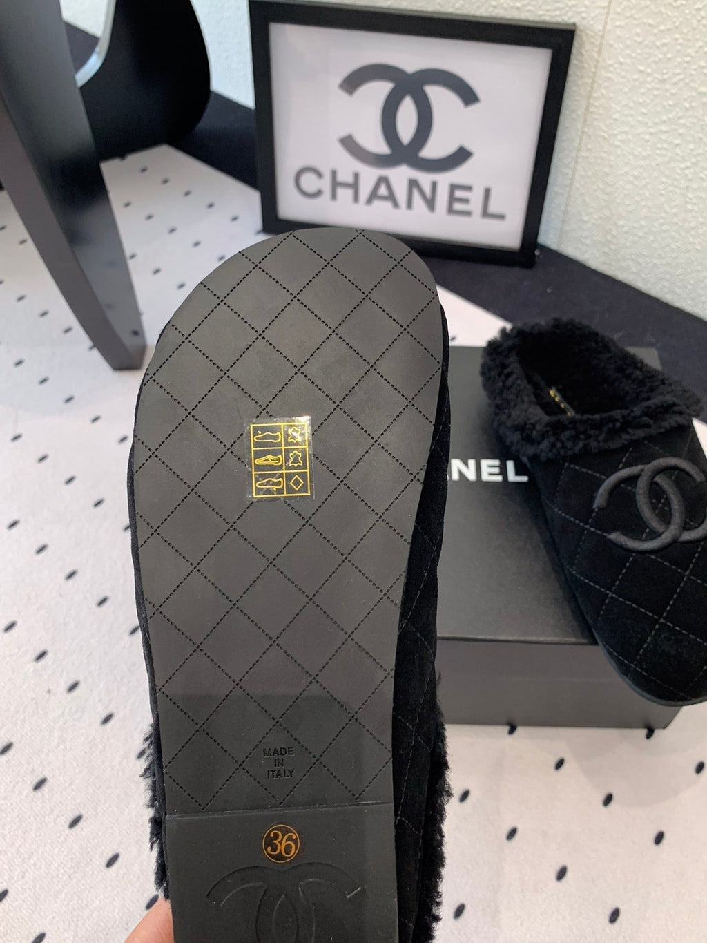 CHANEL FLAT MULE IN BLACK SUEDE AND LAMB FUR LINING