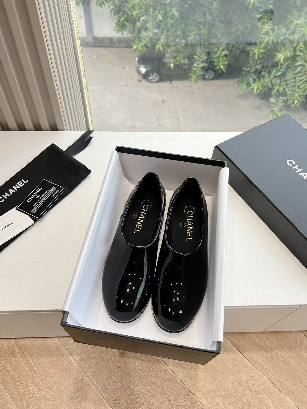 CHANEL MOASINS BLACK PATENT CALFSKIN GHW