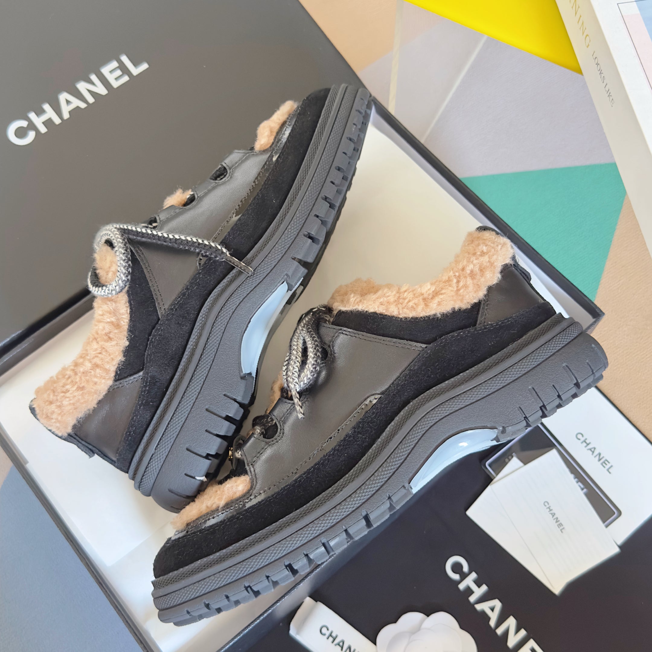 CHANEL 25S SNEAKERS WITH FUR AENTS 40MM IN BLACK AND BROWN CALFSKIN
