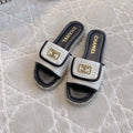 CHANEL PLATFORM SLIPPERS IN WHITE WOOL AND BLACK LAMBSKIN