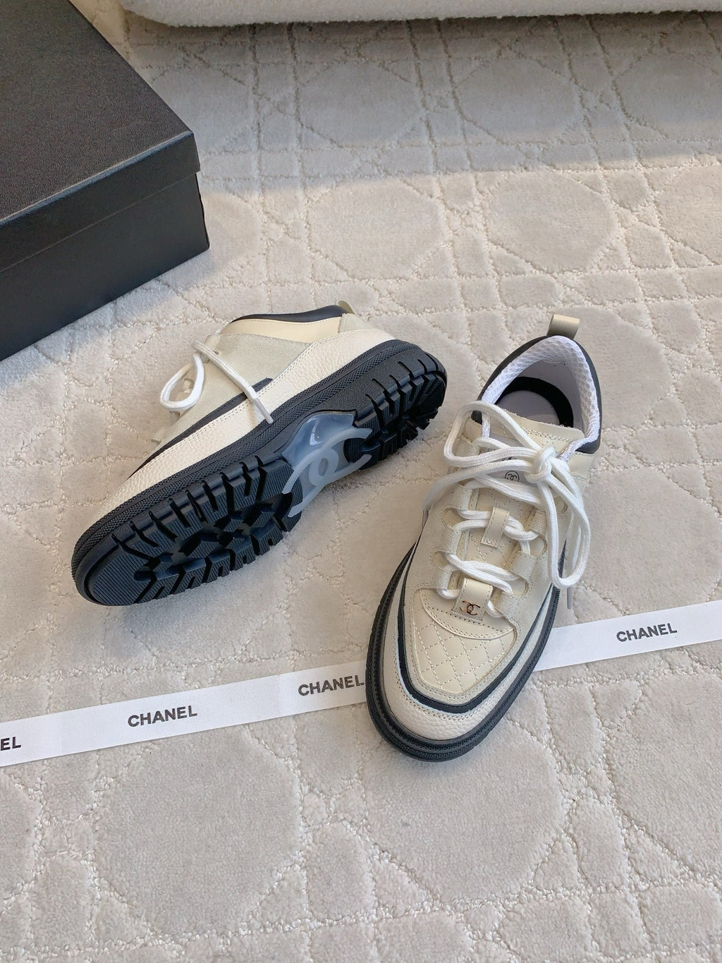 CHANEL 25S TRAINERS 40MM IN WHITE AND BLACK CALFSKIN