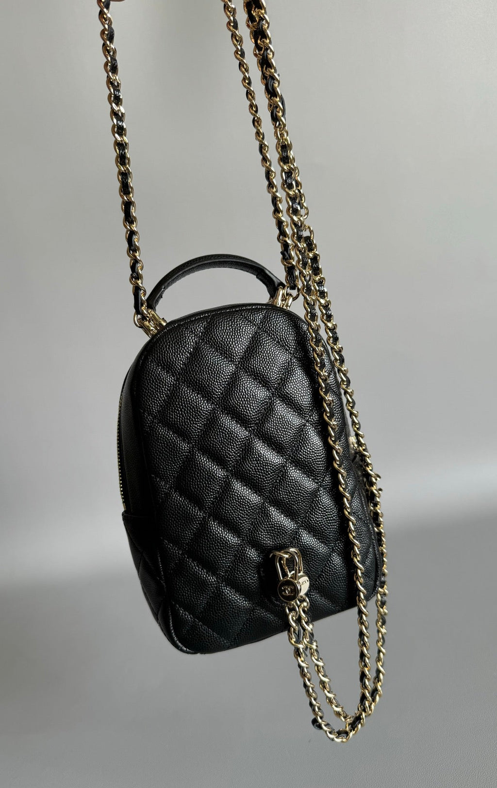 CHANEL MINI 18 BACKPACK BLACK CAVIAR LIGHT GOLD HARDWARE