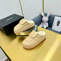 CHANEL THICK-SOLED SLIDE IN LIGHT YELLOW LAMBSKIN AND WOOL LINING