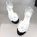 CHANEL WHITE MIX BLACK LAMBSKIN CAMELLIA HOLLOW SANDAL