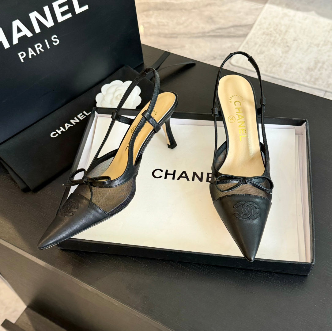 CHANEL MESH LOGO SLINGBACKS IN BLACK LAMBSKIN