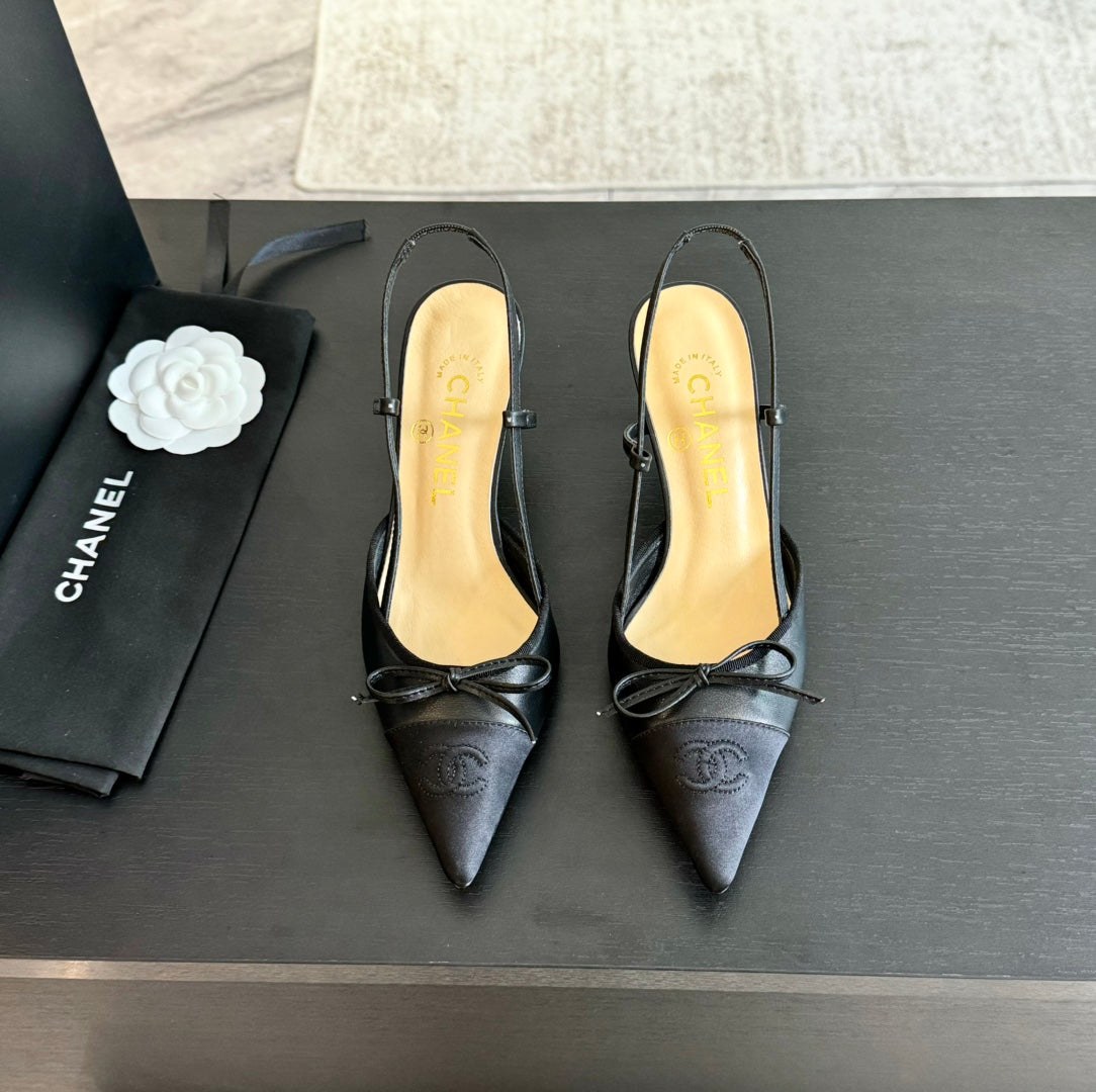 CHANEL SLINGBACK WITH BOW IN BLACK LAMBSKIN