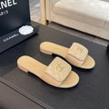 CHANEL FLAT MULE IN TUSCAN BEIGE LAMBSKIN