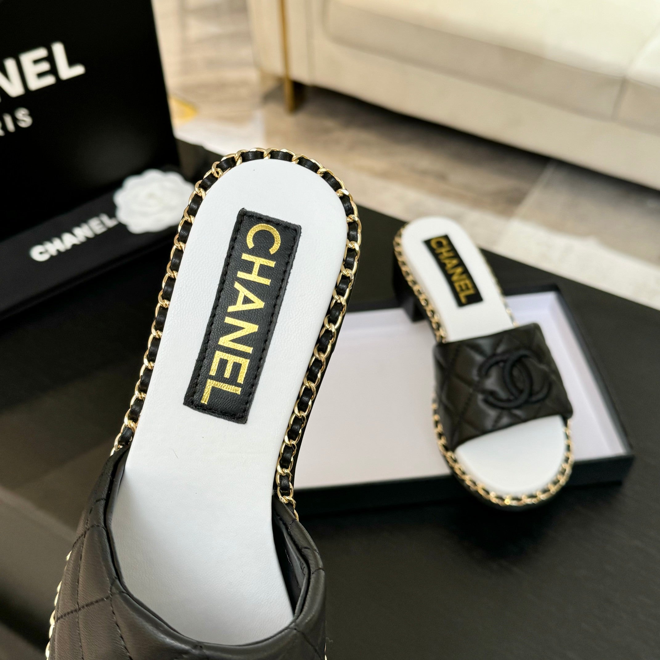 CHANEL HIGH FLATFORM SLIPPER IN BLACK EMBOSSED SHEEPSKIN