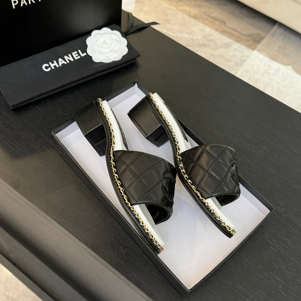 CHANEL HIGH FLATFORM SLIPPER IN BLACK EMBOSSED SHEEPSKIN
