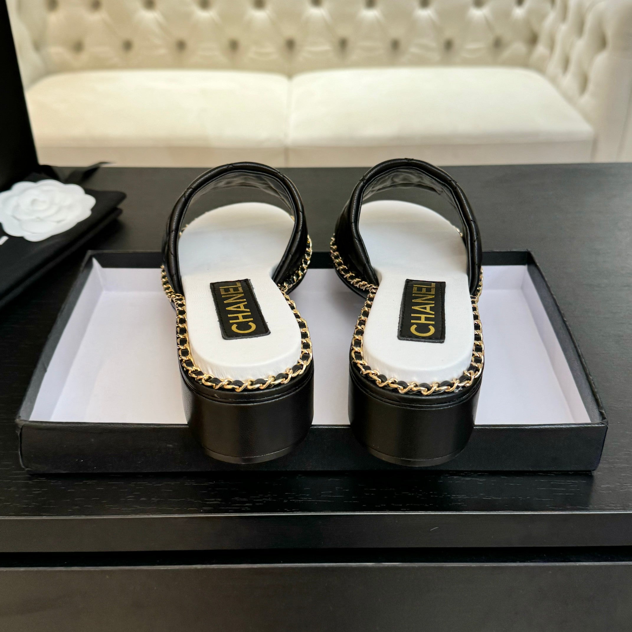 CHANEL HIGH FLATFORM SLIPPER IN BLACK EMBOSSED SHEEPSKIN
