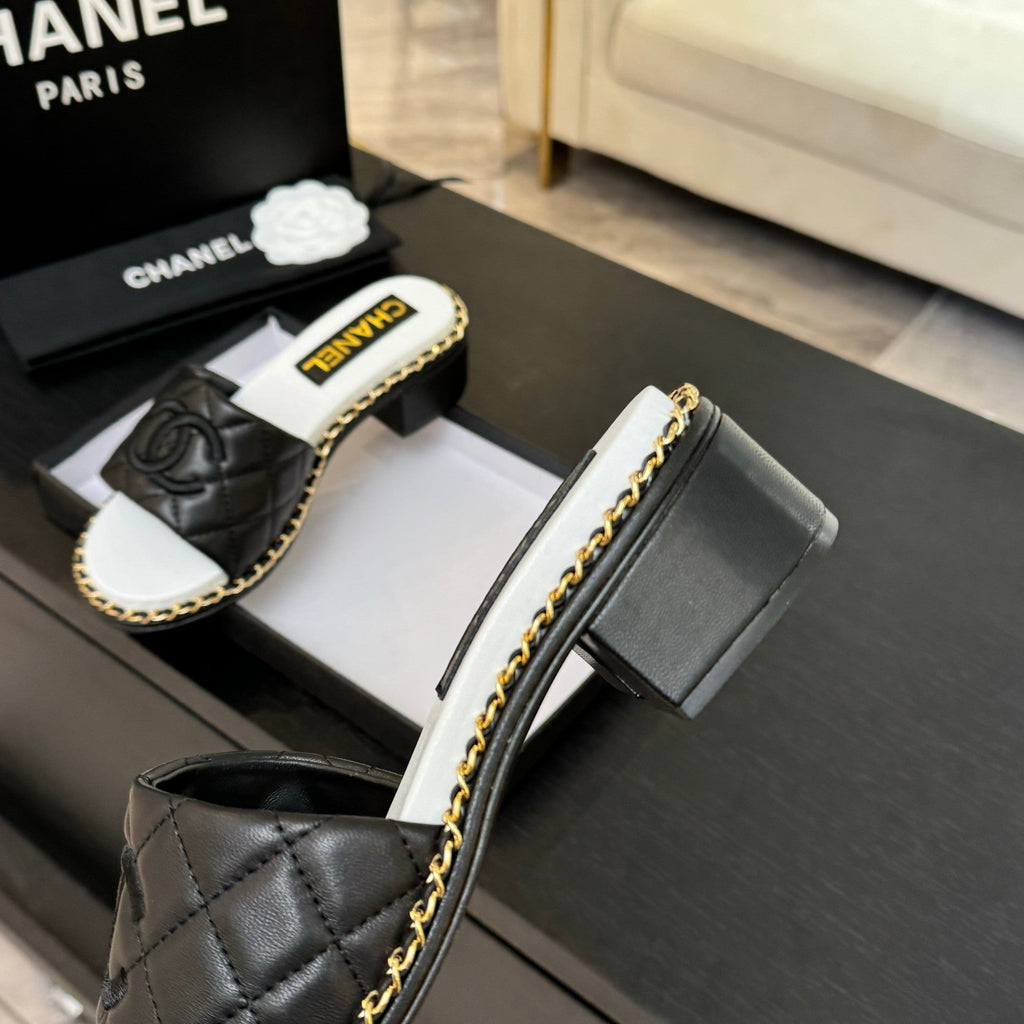 CHANEL HIGH FLATFORM SLIPPER IN BLACK EMBOSSED SHEEPSKIN