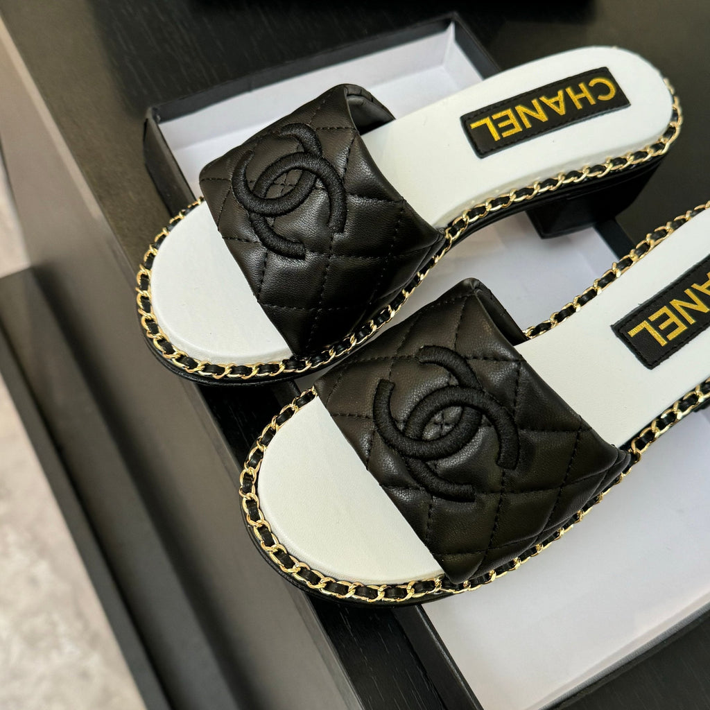 CHANEL HIGH FLATFORM SLIPPER IN BLACK EMBOSSED SHEEPSKIN