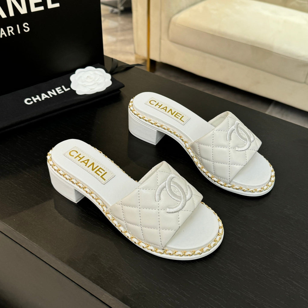 CHANEL HIGH FLATFORM SLIPPER IN WHITE EMBOSSED SHEEPSKIN