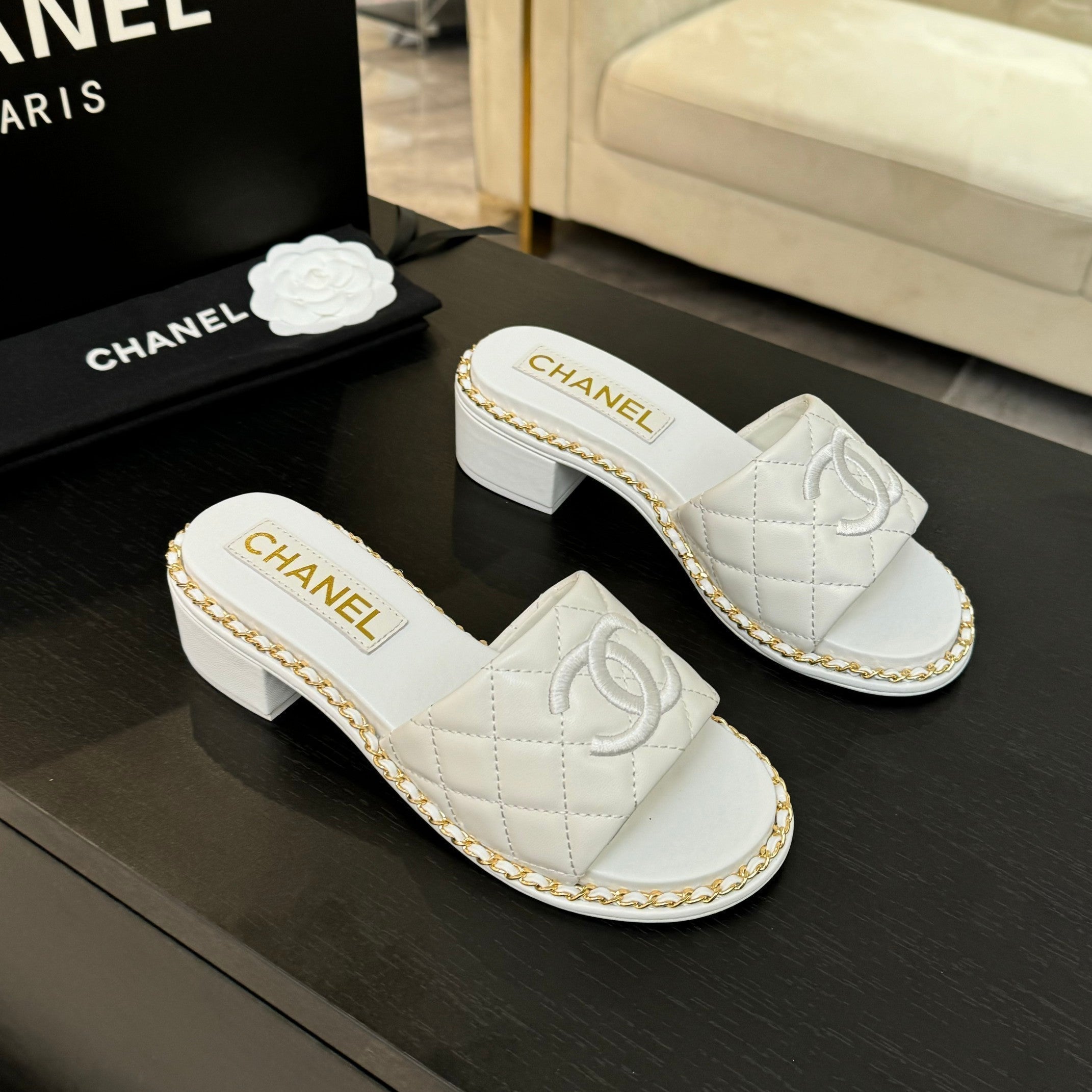 CHANEL HIGH FLATFORM SLIPPER IN WHITE EMBOSSED SHEEPSKIN