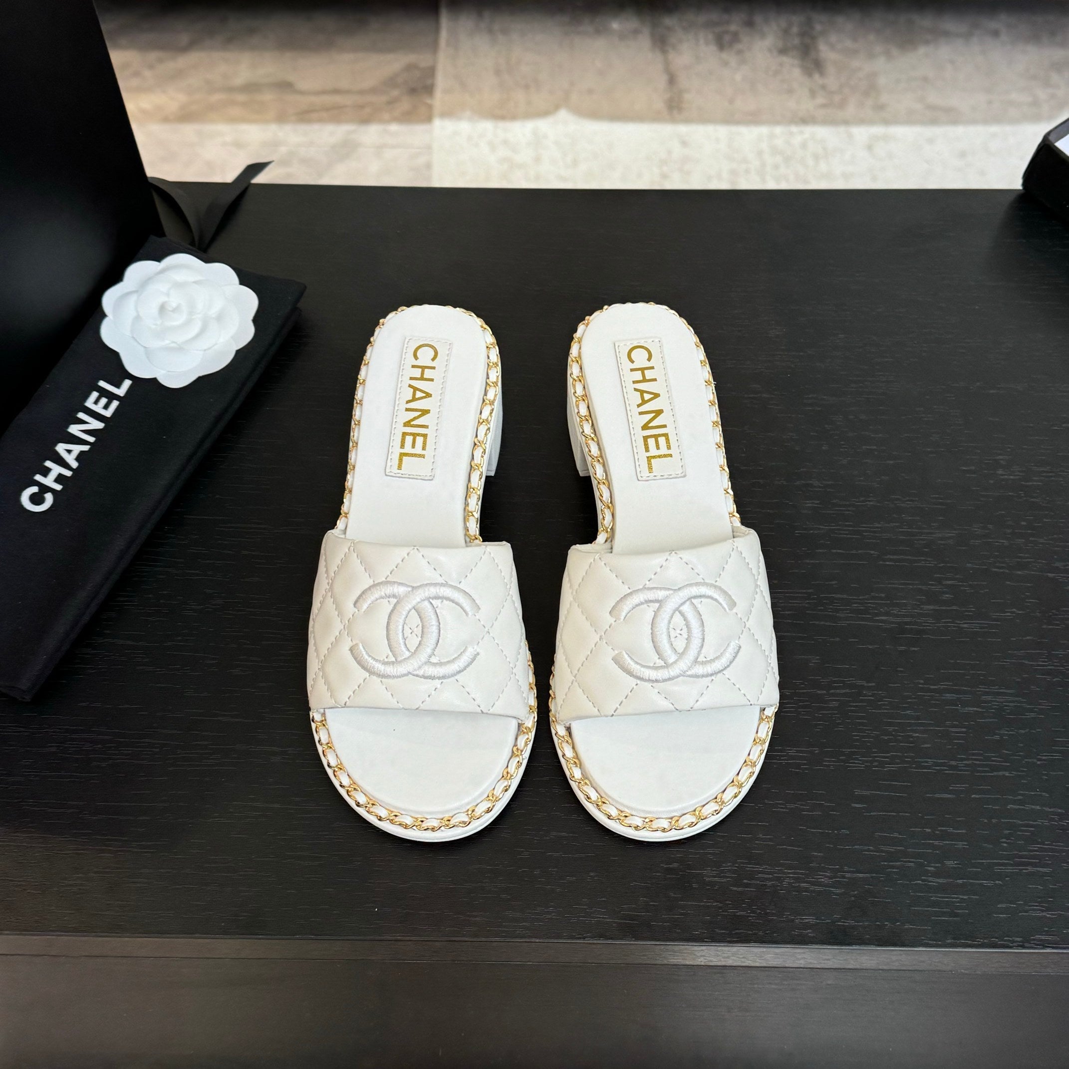 CHANEL HIGH FLATFORM SLIPPER IN WHITE EMBOSSED SHEEPSKIN