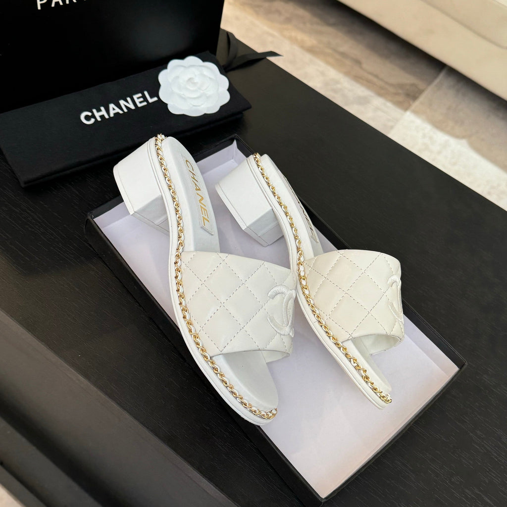 CHANEL HIGH FLATFORM SLIPPER IN WHITE EMBOSSED SHEEPSKIN