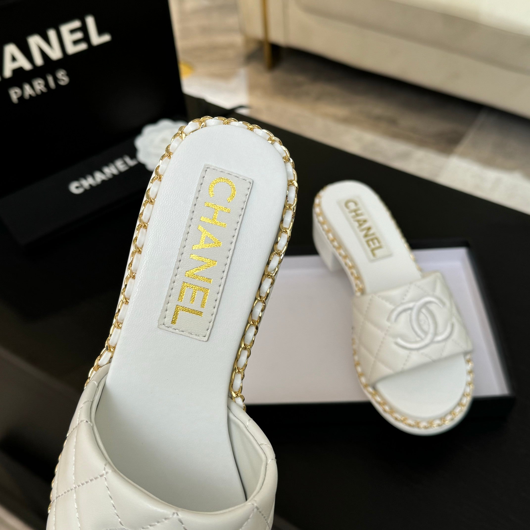 CHANEL HIGH FLATFORM SLIPPER IN WHITE EMBOSSED SHEEPSKIN