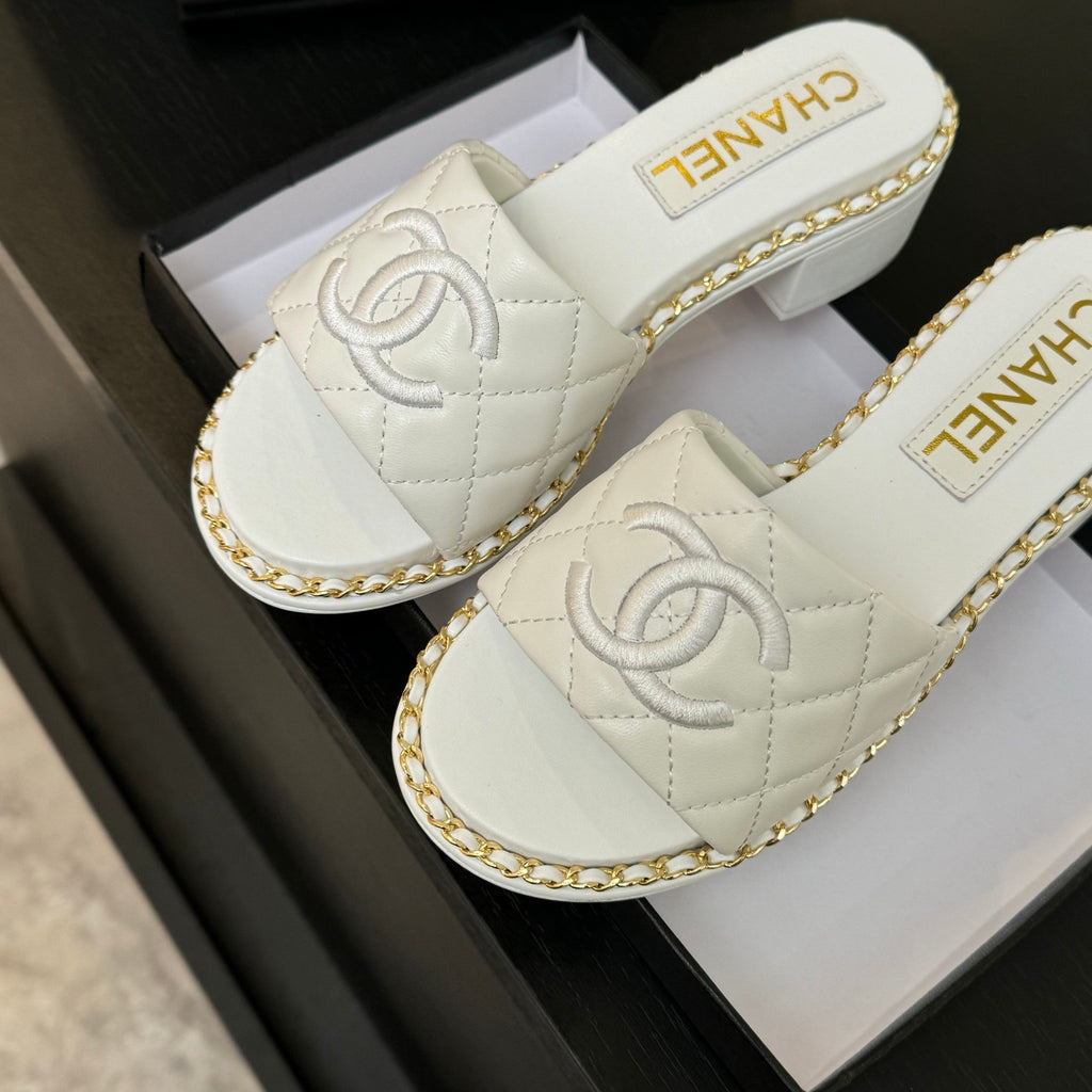CHANEL HIGH FLATFORM SLIPPER IN WHITE EMBOSSED SHEEPSKIN