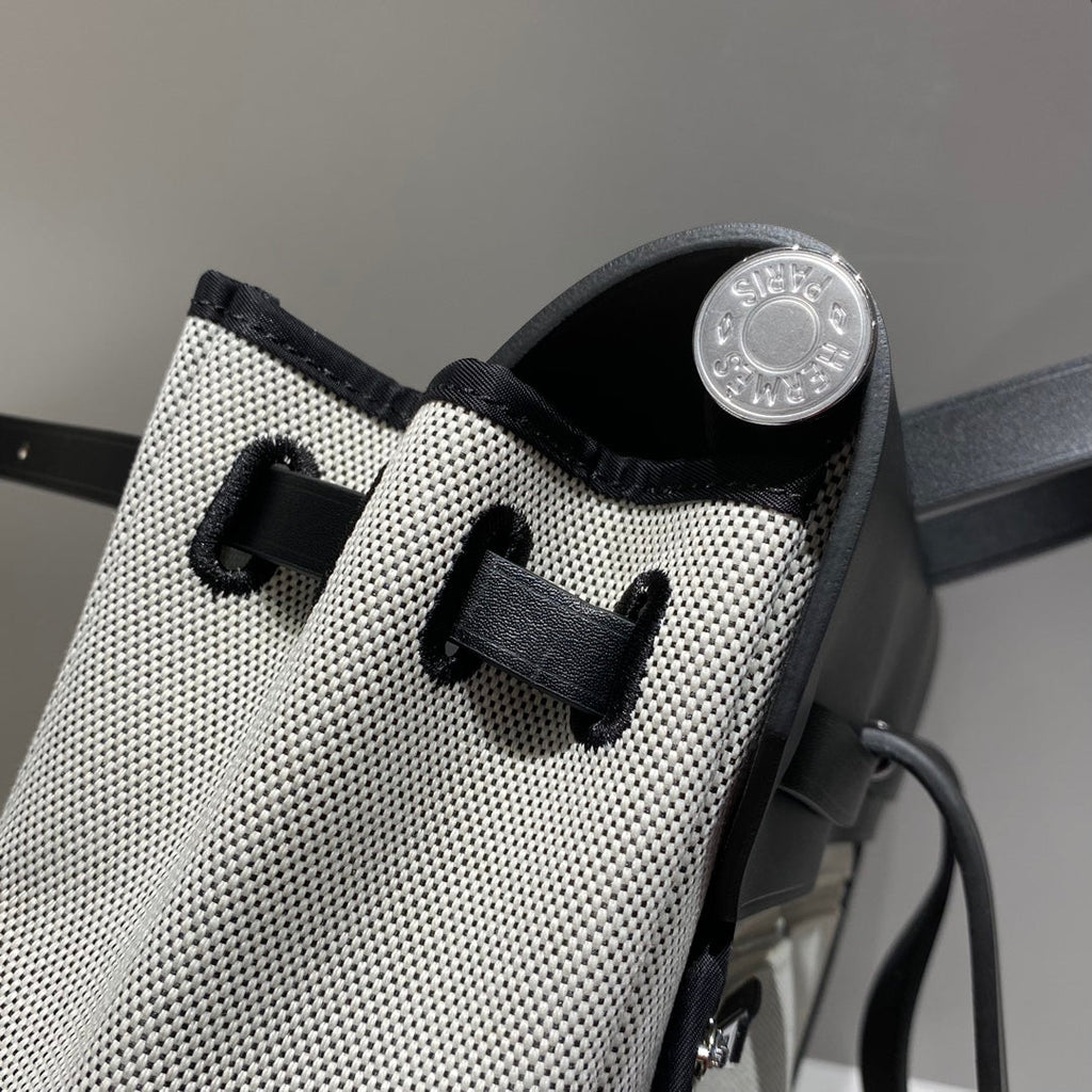 HERMES HERBAG A DOS ZIP RETOURNE BACKPACK 29 IN OFF-WHITE CANVAS AND BLACK CALFSKIN