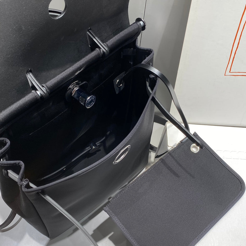 HERMES HERBAG A DOS ZIP RETOURNE BACKPACK 29 IN BLACK CANVAS AND CALFSKIN
