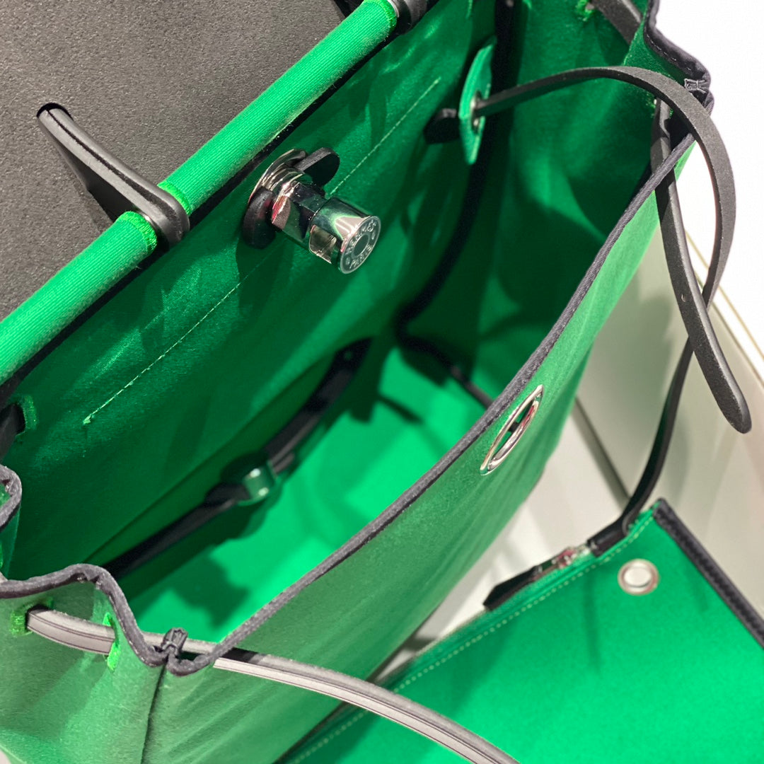 HERMES HERBAG A DOS ZIP RETOURNE BACKPACK 29 IN GREEN CANVAS AND BLACK CALFSKIN