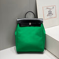 HERMES HERBAG A DOS ZIP RETOURNE BACKPACK 29 IN GREEN CANVAS AND BLACK CALFSKIN