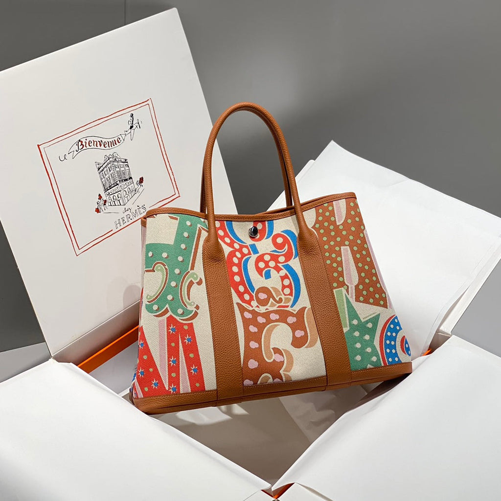 HERMES GARDEN PARTY 36 IN MULTICOLOR TOILE H CANVAS GOLD CALFSKIN CIRCUS TYPOGRAPHY PRINT