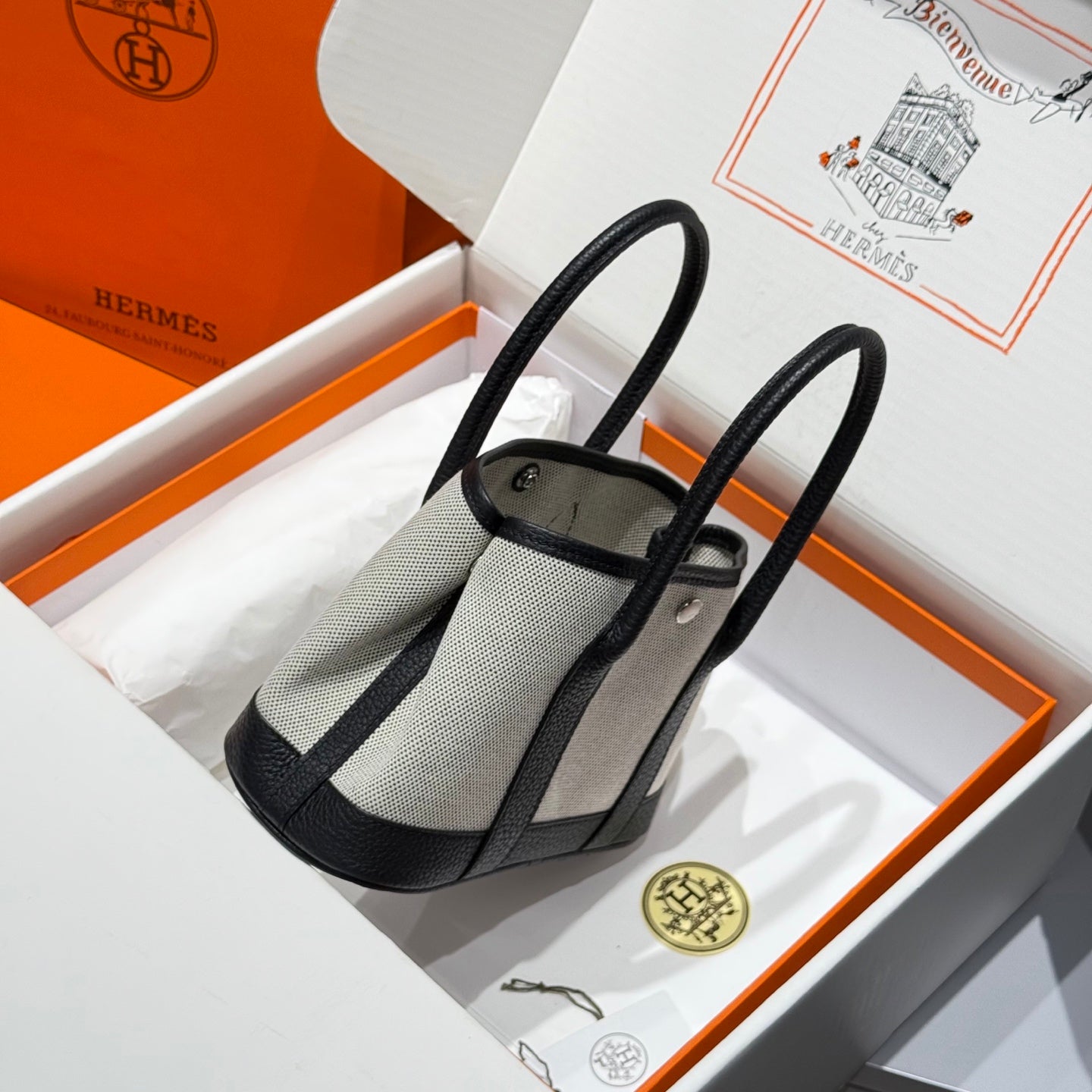 HERMES GARDEN PARTY 23CM IN WHITE TOILETS COTTON CANVAS AND BLACK CALFSKIN