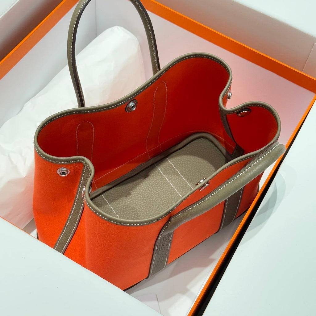 HERMES GARDEN PARTY 30CM IN ORANGE MINIMUM TOILETS COTTON CANVAS AND BROWN CALFSKIN