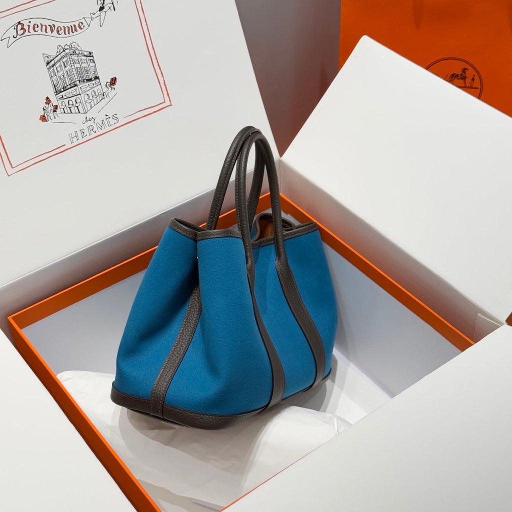 HERMES GARDEN PARTY 30CM IN BLUE TOILETS COTTON CANVAS AND BLACK CALFSKIN