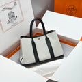 HERMES GARDEN PARTY 30CM IN WHITE TOILETS COTTON CANVAS AND BLACK CALFSKIN