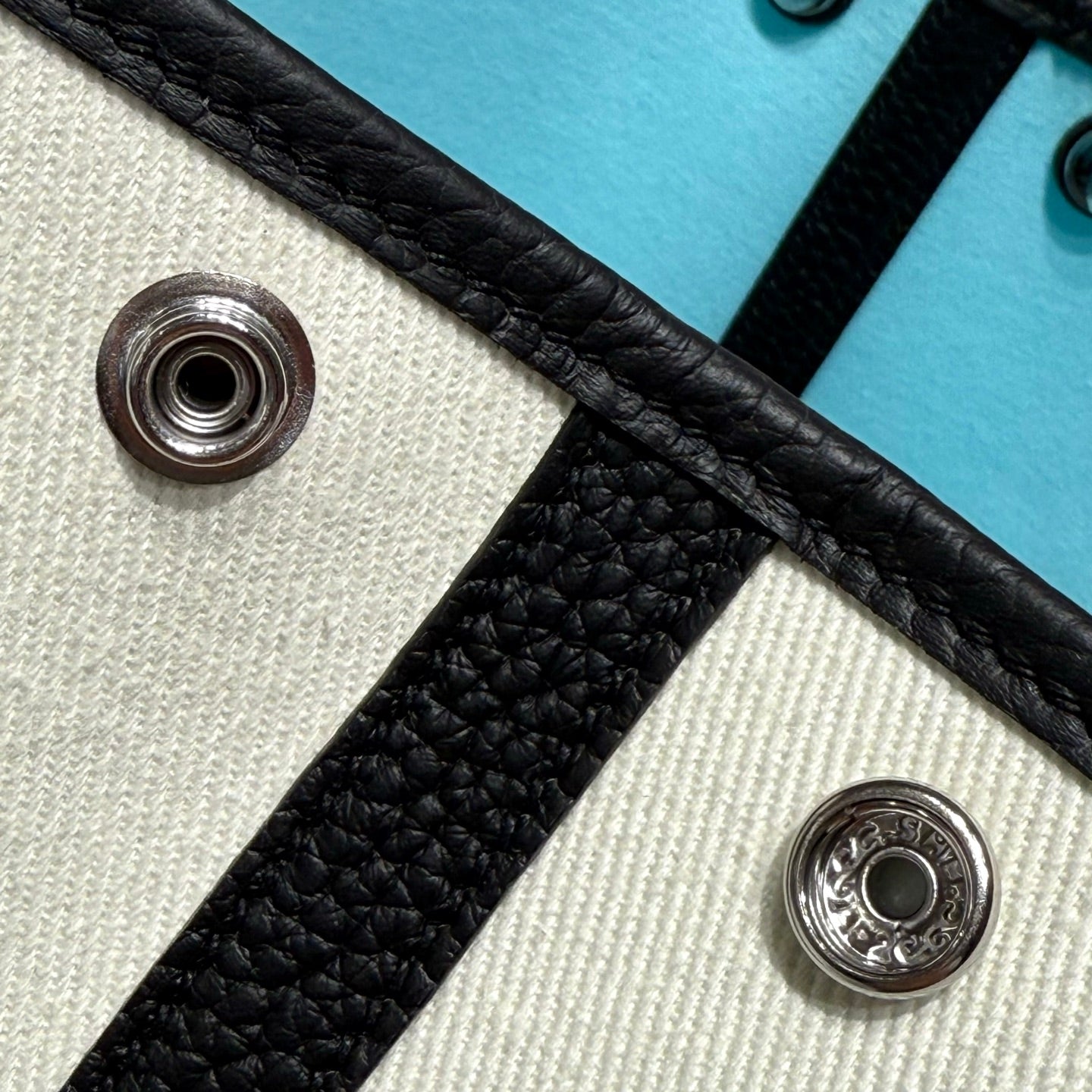 HERMES GARDEN PARTY 30CM IN WHITE TOILETS COTTON CANVAS AND BLACK CALFSKIN SKY BLUE CANVAS ON SIDE OTHER