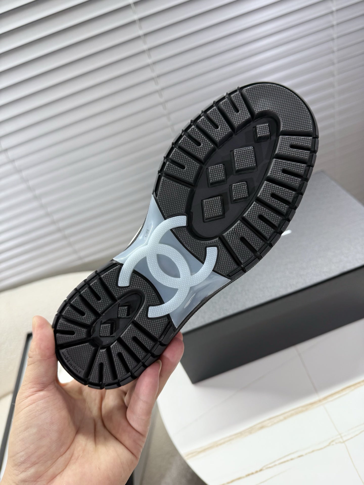 CHANEL 25S SNEAKERS WITH FUR AENTS 35MM IN BLACK CALFSKIN