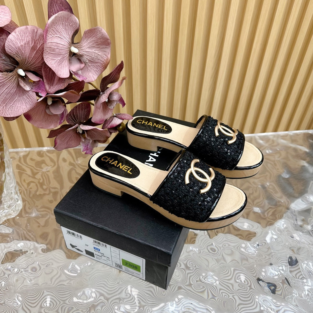 CHANEL PLATFORM SLIPPERS IN BLACK TWEED AND LAMBSKIN