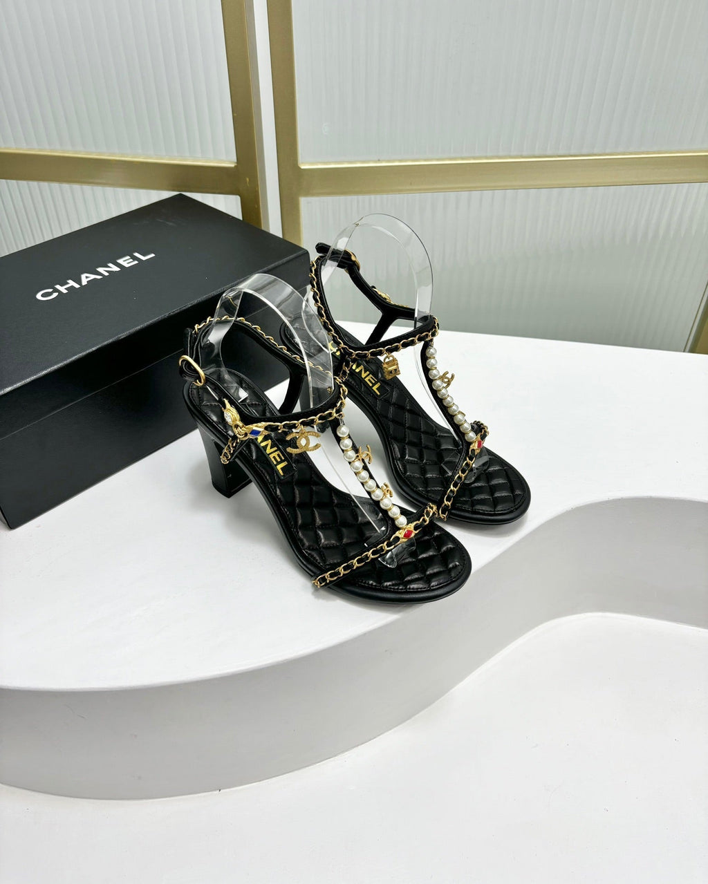 CHANEL HIGH HEELS PEARL CHAIN IN BLACK COWHIDE