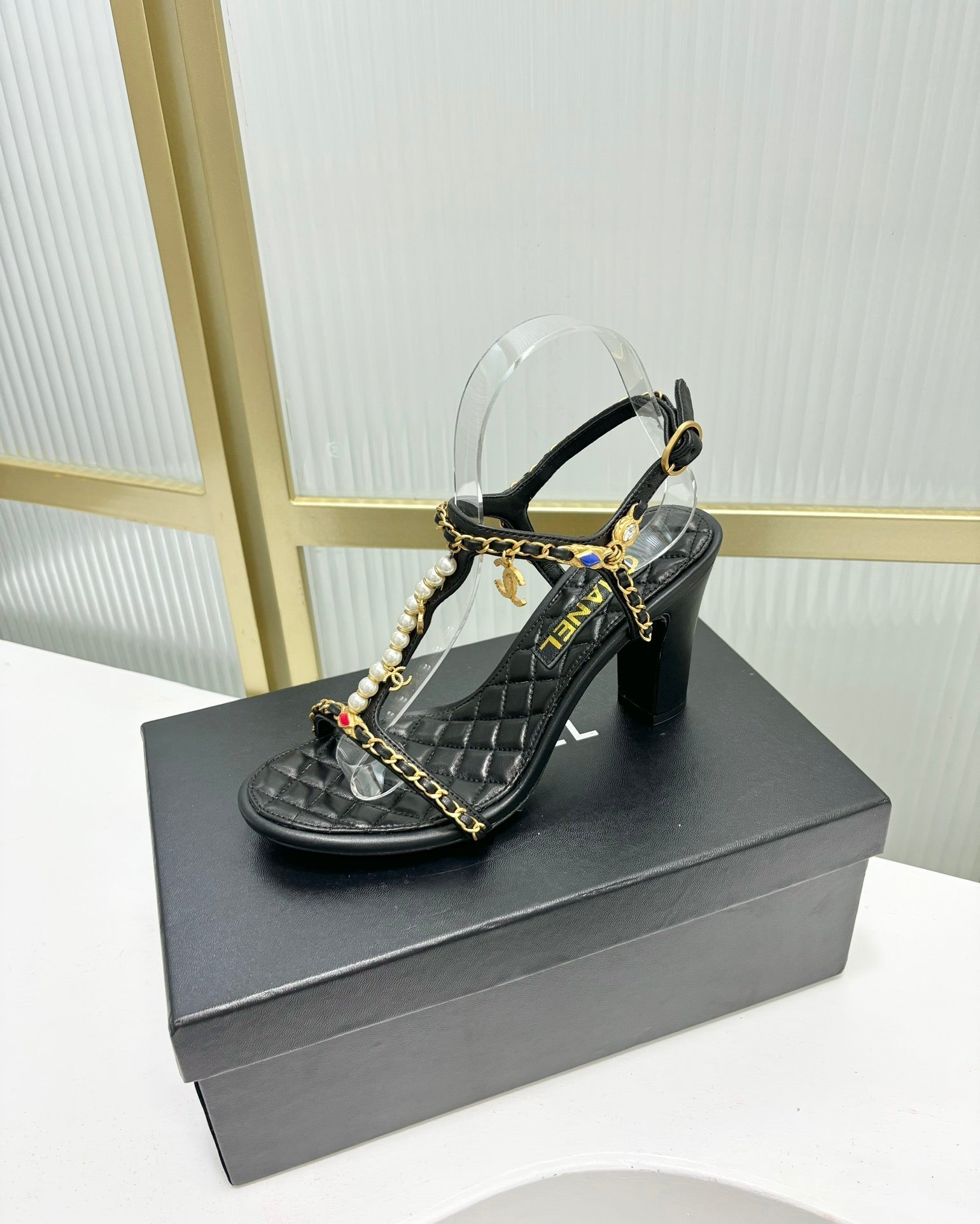 CHANEL HIGH HEELS PEARL CHAIN IN BLACK COWHIDE