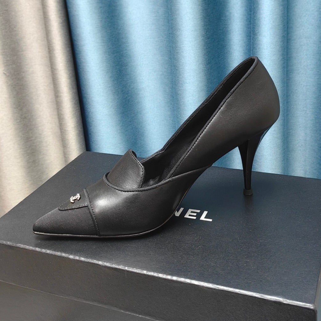 CHANEL HIGH HEELS IN BLACK SHEEPSKIN