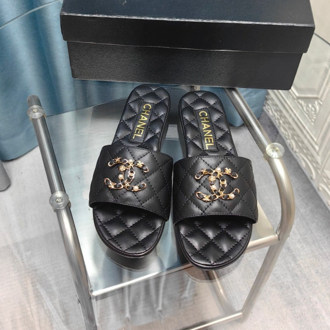 CHANEL QUILTED SLIPPERS BLACK SHEEPSKIN