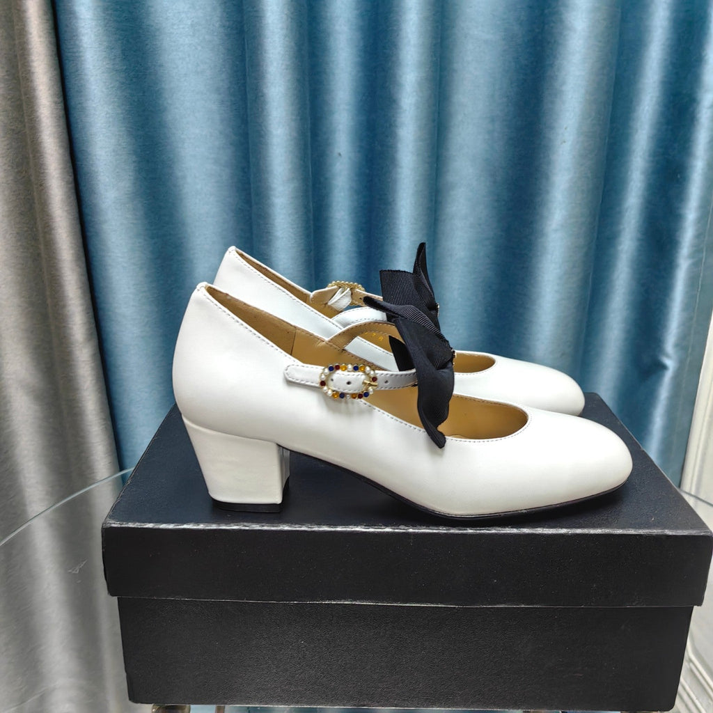 CHANEL HIGH MARY JANE SHOES WHITE SHEEPSKIN WITH BLACK BOW
