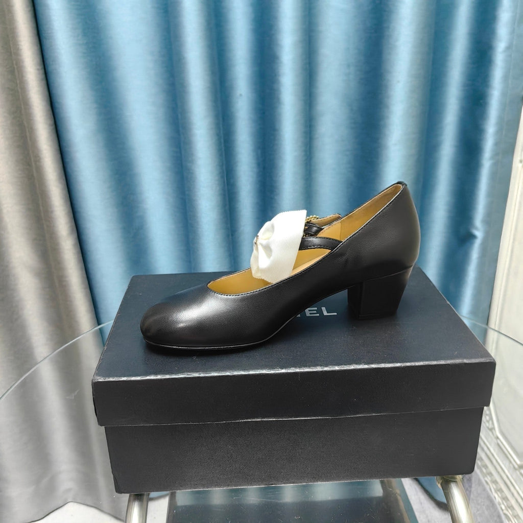 CHANEL HIGH MARY JANE SHOES BLACK SHEEPSKIN WITH WHITE BOW